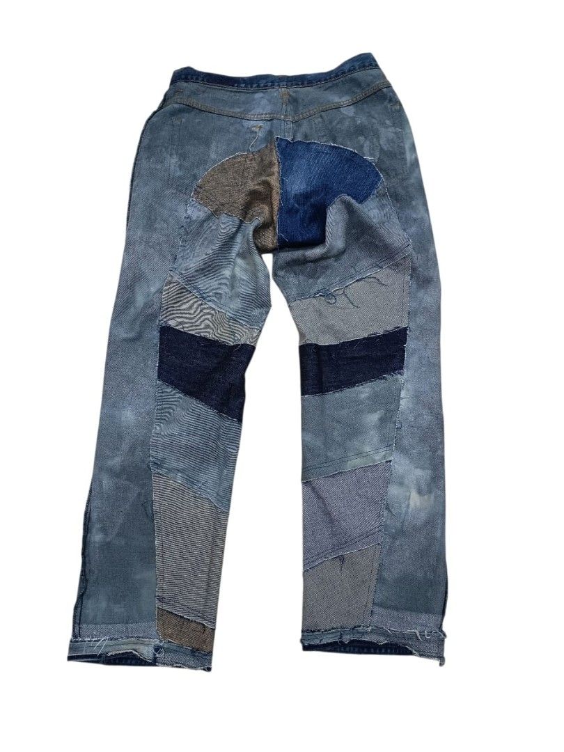 Edwin Patchwork Jeans (Category: Jeans) located in Pasir Mas. Submitted by Glory1985 (Listing ID 1423578026, Image 3). Description: - Edwin jeans -size 32 Labuh 40 - Patchwork design - Button closure and zipper - Distinctive blue wash - Kua label on back pocket - Made in USA.