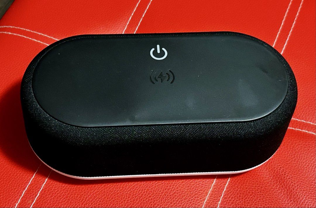 Gadgets Multi-Function Clock with Wireless Charger (Category: Clocks) located in Las Pinas. Submitted by rjmwings (Listing ID 1423535170, Image 3). Description: Multi-function clock from Gadgets Features a Bluetooth speaker and wireless charging capabilities. It also includes an alarm clock, temperature display, and 10 LED mood lights. The unit comes with a USB cable and a user manual. The box indicates a model number of NG-CWC2..