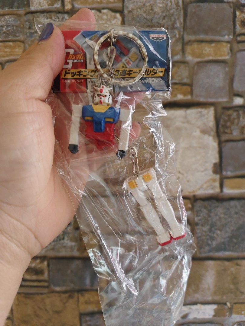 Gundam RX-78-2 Keychain (Category: Character Goods) located in La Trinidad. Submitted by syakniseph1105 (Listing ID 1423491721, Image 1). Description: - Gundam RX-78-2 keychain - Detachable design - Still sealed in original packaging - Includes Gundam's torso and legs - Perfect for Gundam fans and collectors.
