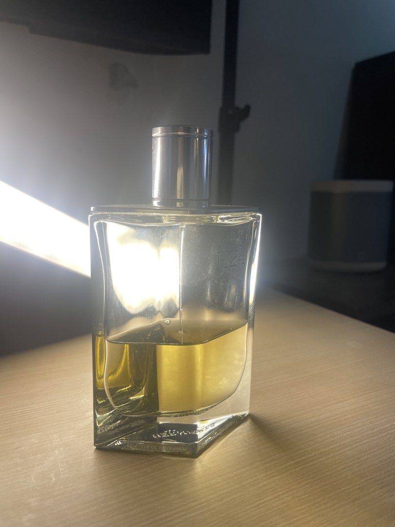 Hermès H24 EDP 100ml (Category: Fragrance & Deodorants) located in Pasig City. Submitted by xtiansa (Listing ID 1423614515, Image 2). Description: - Hermès H24 Eau De Toilette Spray - 100ml / 3.3oz - Original bottle - Silver cap - Clear, rectangular design - Light yellow liquid 50-55 ml juice level Authentic with box .
