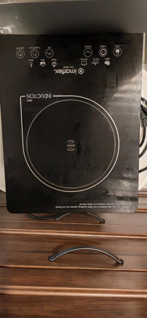 Imarflex Slim Type Induction Cooker (Category: Cookware & Accessories) located in Mandaluyong City. Submitted by odaysmith (Listing ID 1423588391, Image 1). Description: Induction Cooker - 6 Preset Function (Barbeque, Stir-fry, Hot Pot, Soup, Boil, Warm) - Slim Type (50mm) - 1073cm2 Glass Surface - Max 26cm Pot - Touch Control Panel - High Energy Efficiency - Auto-sense ON Pot - Auto-off Feature - Overload Protection - 15kg Heavy Duty - Up to 24-
