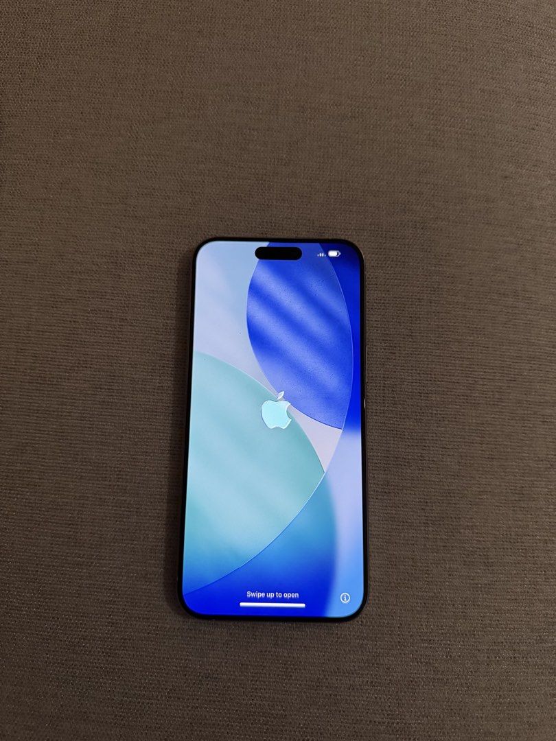 Iphone 15 pro max (Category: iPhone 15 Series) located in Pasig City. Submitted by nicll (Listing ID 1423517674, Image 2). Description: Iphone 15 pro max 256gb White Titanium 80% battery health Barely noticeable to no scratches at all Used with care Rfs: Upgraded .