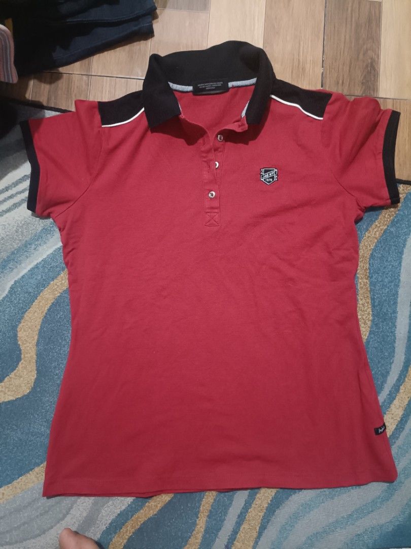 Jag Jeans Red Polo Shirt (Category: Blouses) located in Marikina City. Submitted by elleselections (Listing ID 1423513682, Image 1). Description: Size: med-large Good as new - Jag Jeans red polo shirt - Size 4 - Black collar and sleeve cuffs with white accents - Button-up placket - Small logo on chest.