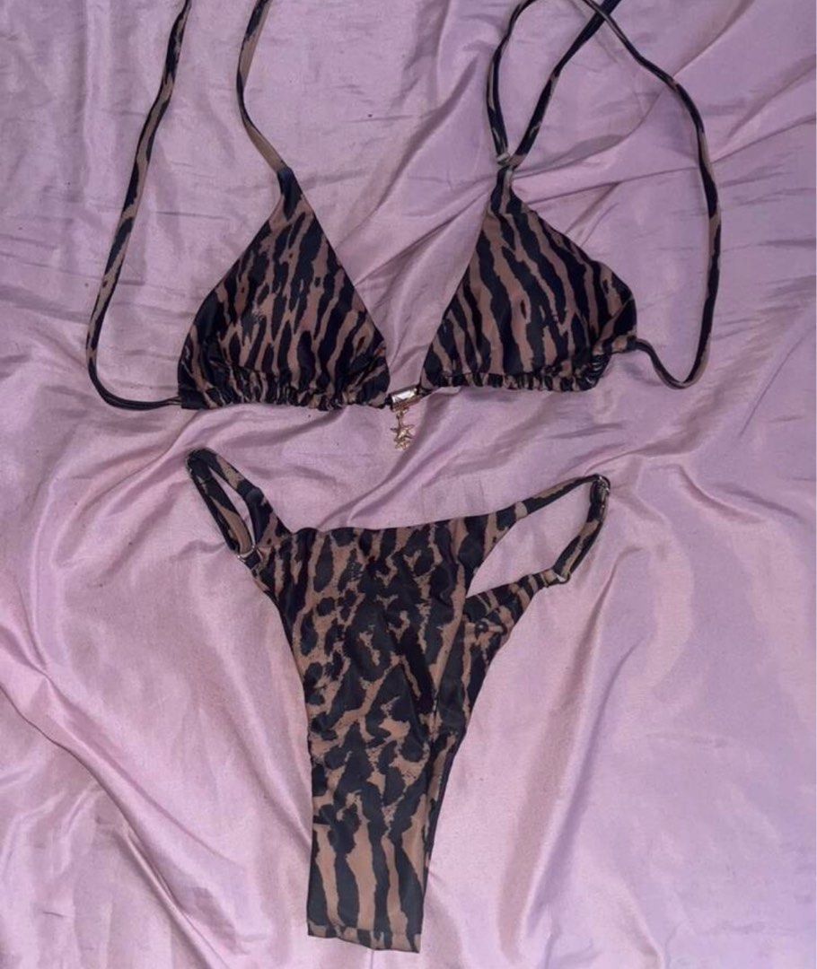 Leopard 2pc swimsuit with detail (Category: Bikinis & Swimsuits) located in Pasig City. Submitted by ____andd (Listing ID 1423474078, Image 2). Description: old acc with 100+ reviews got hacked. .