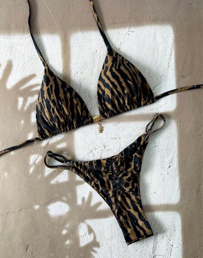 Leopard 2pc swimsuit with detail (Category: Bikinis & Swimsuits) located in Pasig City. Submitted by ____andd (Listing ID 1423474078, Image 1). Description: old acc with 100+ reviews got hacked. .