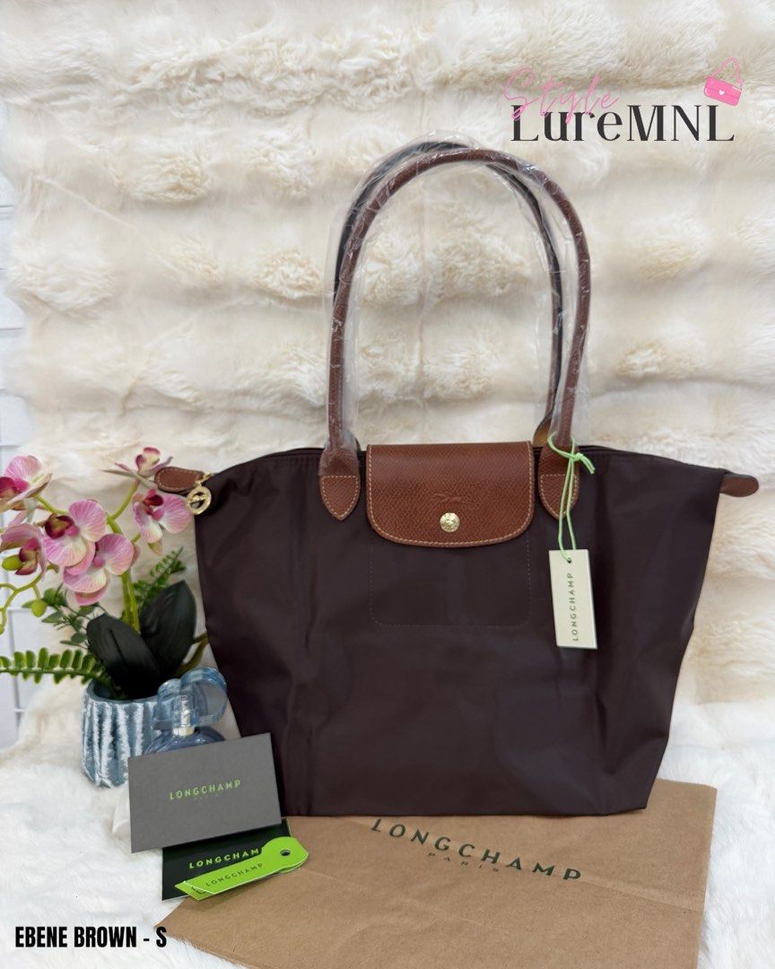 Longchamp Le Pliage Tote Bag - Small (Category: Luxury Bags & Wallets) located in Quezon City. Submitted by styleluremnl (Listing ID 1423578749, Image 3). Description: •Longchamp Le Pliage Small • Paper Bag & Care Card.