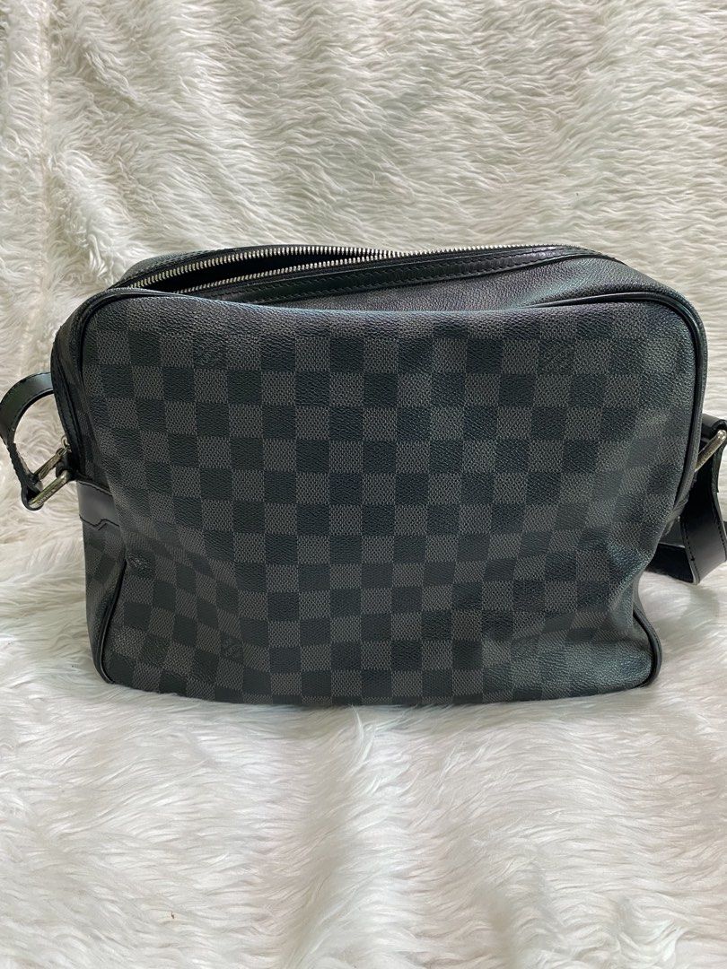 Louis Vuitton Damier Graphite Messenger Bag (Category: Luxury Bags & Wallets) located in Malolos. Submitted by yamaguchionline (Listing ID 1423511033, Image 2). Description: - Authentic Louis Vuitton messenger bag - Damier Graphite canvas - Made in France - Adjustable shoulder strap - Spacious main compartment with multiple pockets - Secure zip closure - Serial number: AR3088 - Dimensions: Approx. 28cm x 22cm x 10cm -Guaranteed Authentic -Money b