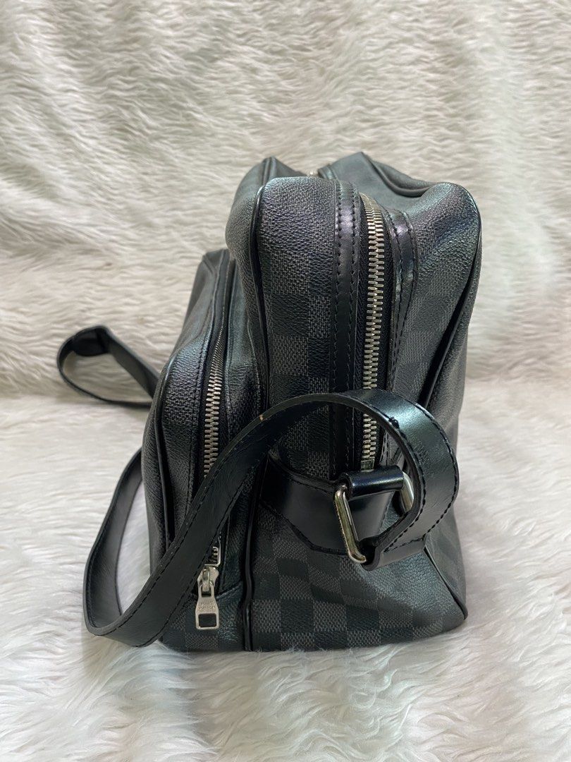 Louis Vuitton Damier Graphite Messenger Bag (Category: Luxury Bags & Wallets) located in Malolos. Submitted by yamaguchionline (Listing ID 1423511033, Image 3). Description: - Authentic Louis Vuitton messenger bag - Damier Graphite canvas - Made in France - Adjustable shoulder strap - Spacious main compartment with multiple pockets - Secure zip closure - Serial number: AR3088 - Dimensions: Approx. 28cm x 22cm x 10cm -Guaranteed Authentic -Money b