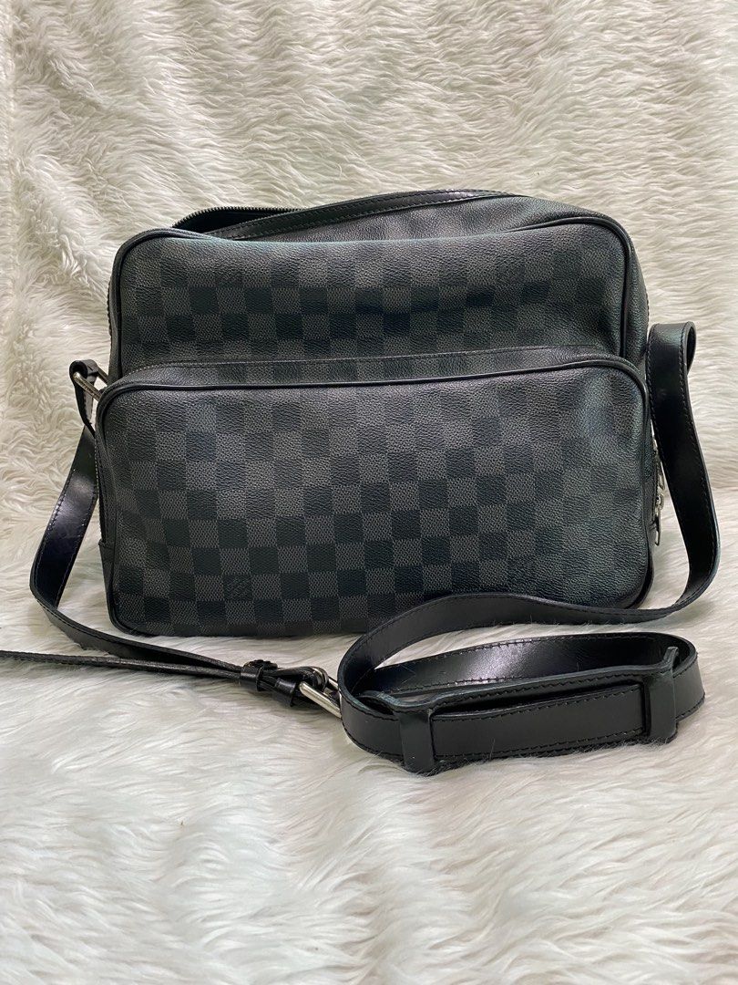 Louis Vuitton Damier Graphite Messenger Bag (Category: Luxury Bags & Wallets) located in Malolos. Submitted by yamaguchionline (Listing ID 1423511033, Image 1). Description: - Authentic Louis Vuitton messenger bag - Damier Graphite canvas - Made in France - Adjustable shoulder strap - Spacious main compartment with multiple pockets - Secure zip closure - Serial number: AR3088 - Dimensions: Approx. 28cm x 22cm x 10cm -Guaranteed Authentic -Money b
