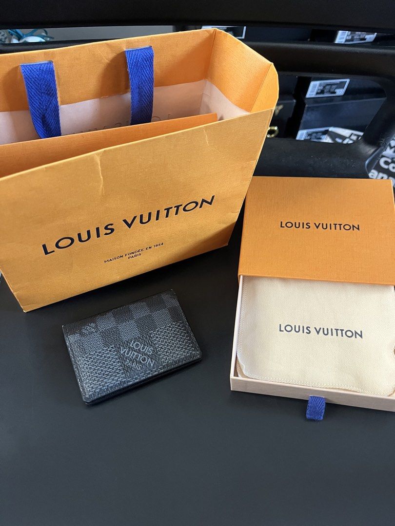 Louis Vuitton Damier Graphite Organizer Card Case (Category: Luxury Bags & Wallets) located in Makati City. Submitted by threadsfordays (Listing ID 1423515890, Image 1). Description: Louis V Damier Graphite Organizer Card Case With paperbag and receipt Used once only/ fresh unit Selling for 15,995 only, 30k srp.
