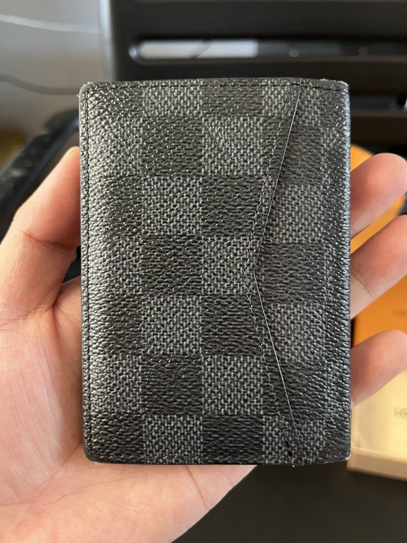 Louis Vuitton Damier Graphite Organizer Card Case (Category: Luxury Bags & Wallets) located in Makati City. Submitted by threadsfordays (Listing ID 1423515890, Image 3). Description: Louis V Damier Graphite Organizer Card Case With paperbag and receipt Used once only/ fresh unit Selling for 15,995 only, 30k srp.