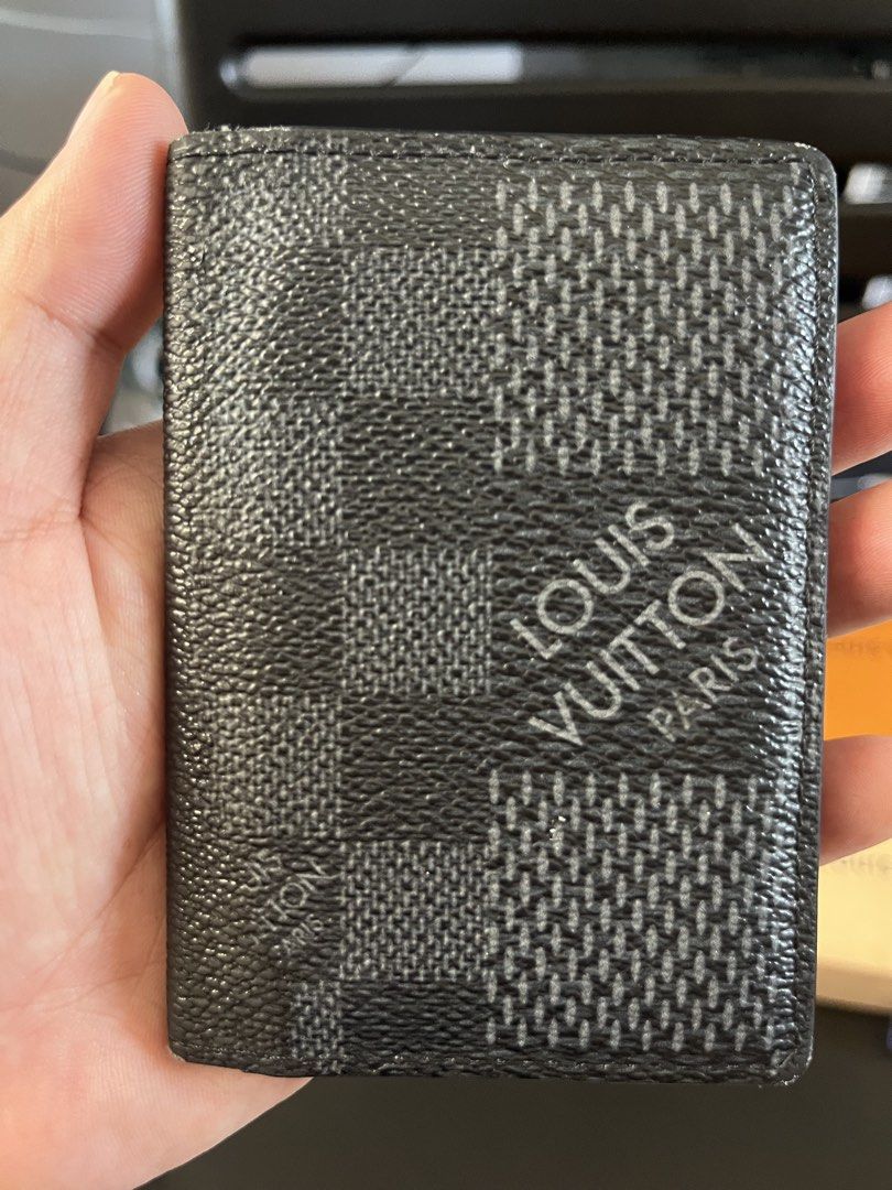 Louis Vuitton Damier Graphite Organizer Card Case (Category: Luxury Bags & Wallets) located in Makati City. Submitted by threadsfordays (Listing ID 1423515890, Image 2). Description: Louis V Damier Graphite Organizer Card Case With paperbag and receipt Used once only/ fresh unit Selling for 15,995 only, 30k srp.