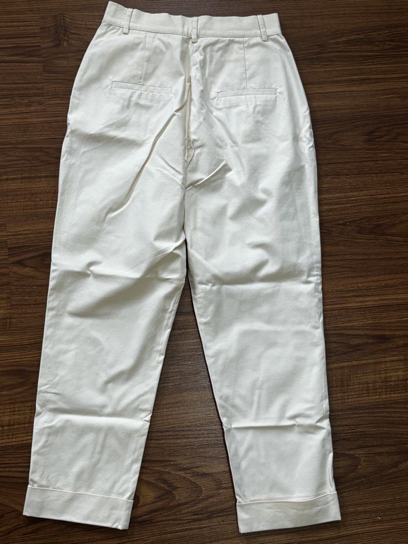 Love Bonito Off White Trousers (Category: Other Bottoms) located in Quezon City. Submitted by mkr888 (Listing ID 1423511993, Image 3). Description: Hi! Selling my Love Bonito Trousers. The buttons are somewhat overlapping. Zipper closure. It also has 2 front pockets. The color is somewhat off white-beige with a hint of yellow. Guaranteed store bought. Used only once. Still in great condition. Price is slightly negotiable:) Payment method: Gcash/M