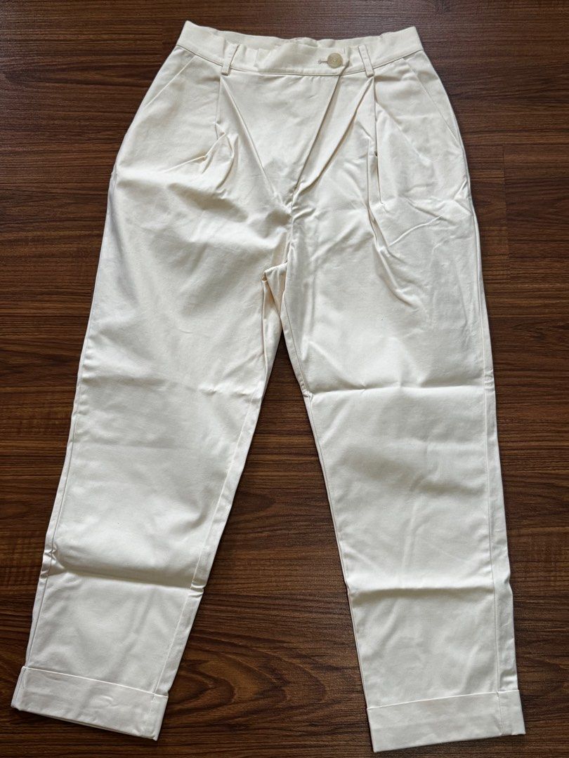 Love Bonito Off White Trousers (Category: Other Bottoms) located in Quezon City. Submitted by mkr888 (Listing ID 1423511993, Image 1). Description: Hi! Selling my Love Bonito Trousers. The buttons are somewhat overlapping. Zipper closure. It also has 2 front pockets. The color is somewhat off white-beige with a hint of yellow. Guaranteed store bought. Used only once. Still in great condition. Price is slightly negotiable:) Payment method: Gcash/M