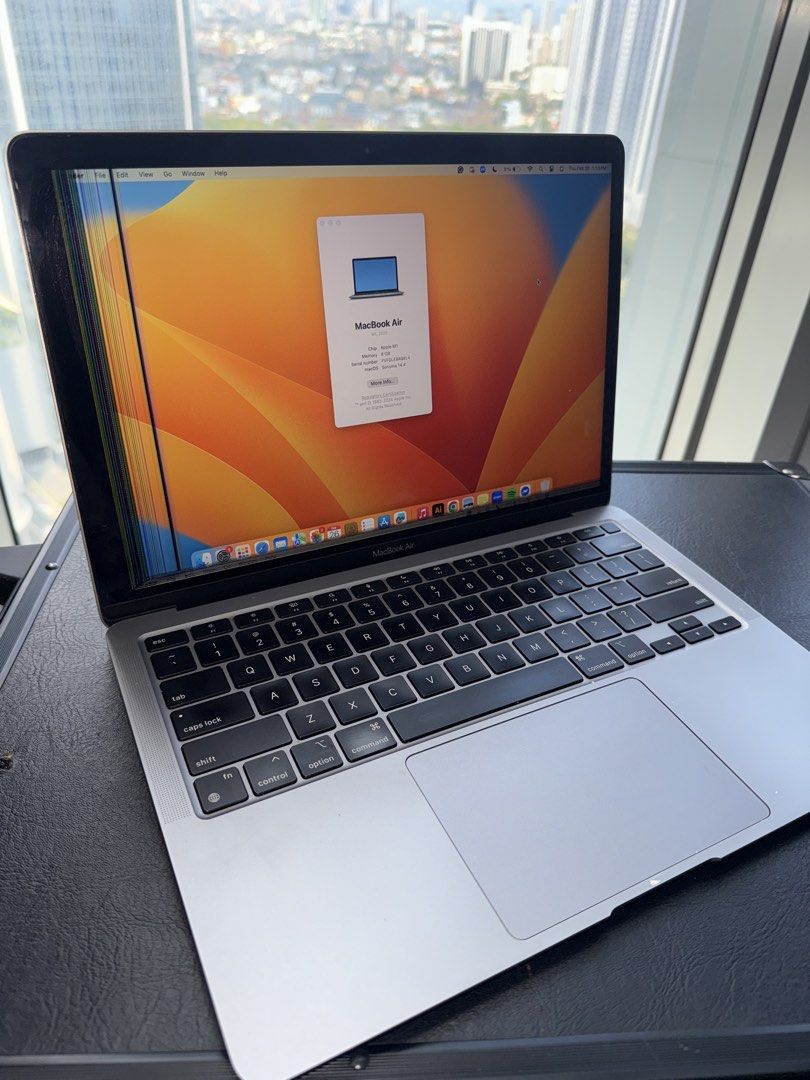 RUSH MacBook Air M1 2020 (with LCD Flaw) (Category: Laptops & Notebooks) located in Makati City. Submitted by ll.archives (Listing ID 1423478108, Image 1). Description: MacBook Air M1 2020 with 8GB memory 256GB SSD and 13.3-inch Retina display. -Apple M1 chip and runs macOS Sonoma. -Battery Health: Normal Maximum capacity at 85%. Cycle count: 425 -FLAW: There are some visible lines on the side of the screen. -Minor flaws: With 2 dents (Bottom and