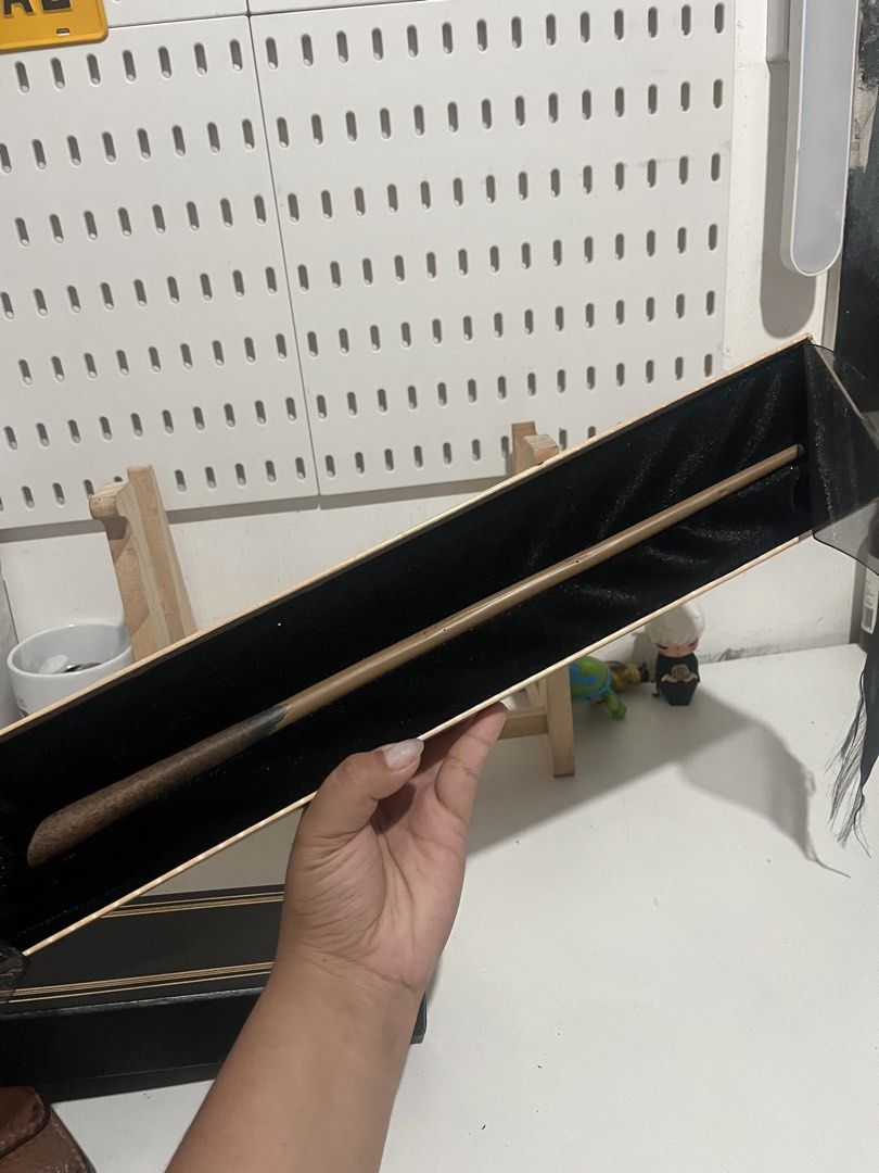 Magic Wand with Box (Category: Western Merchandise) located in Magsingal. Submitted by tanyaysabellucero (Listing ID 1423459800, Image 2). Description: - Newt Scamander Wand - Includes original black box with gold lettering - Comes with a black velvet-lined box for storage.
