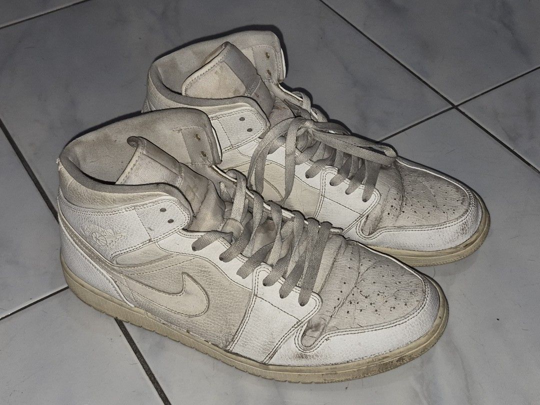 Nike Air Jordan 1 Mid White (Category: Sneakers) located in Valenzuela. Submitted by heubert_420 (Listing ID 1423489339, Image 2). Description: - Nike Air Jordan 1 Mid - US Size 12 - Iconic Nike swoosh - Includes original laces - Production date: 08/07/19.