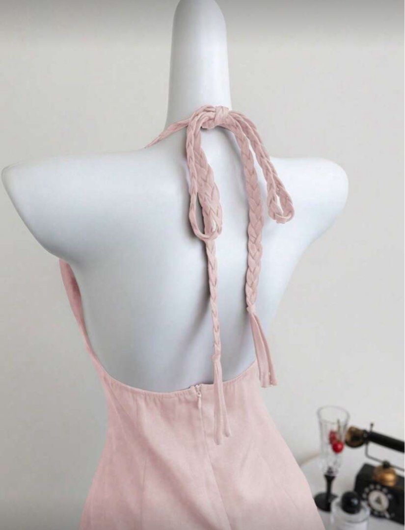 Pink Halter Dress (Category: Dresses) located in Dasmarinas. Submitted by _beautifulthings_ (Listing ID 1423451273, Image 3). Description: - Pink halter mini dress - V-neckline - Fitted bodice - Braided halter straps - Back zipper closure - Mini length - Perfect for casual outings or special occasions.