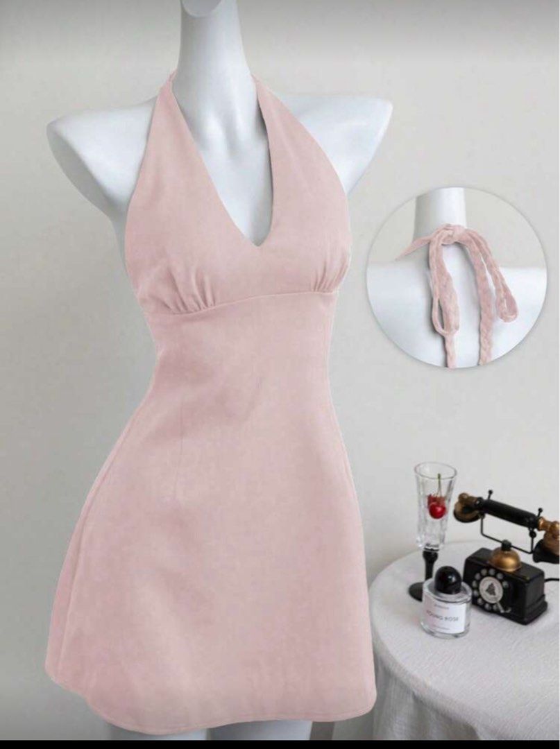 Pink Halter Dress (Category: Dresses) located in Dasmarinas. Submitted by _beautifulthings_ (Listing ID 1423451273, Image 1). Description: - Pink halter mini dress - V-neckline - Fitted bodice - Braided halter straps - Back zipper closure - Mini length - Perfect for casual outings or special occasions.