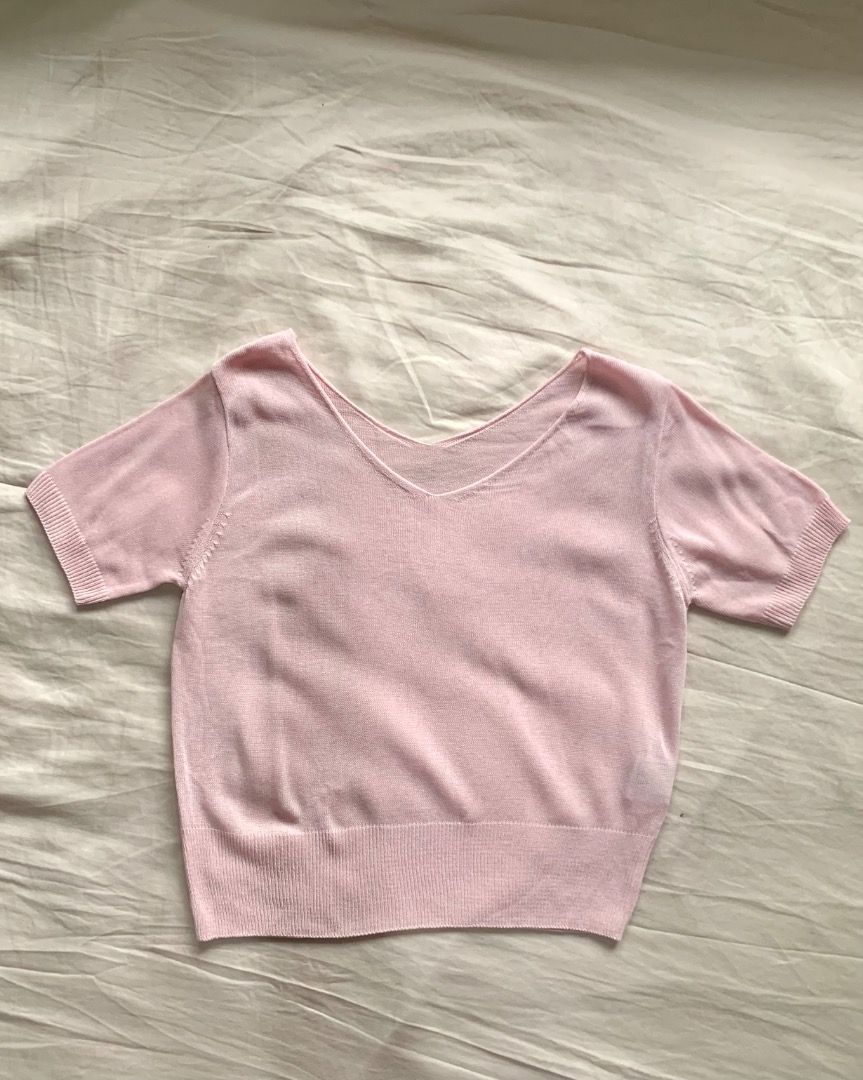 Pink V-Neck Short Sleeve Knitted Top (Category: Blouses) located in Makati City. Submitted by maipw (Listing ID 1423462792, Image 2). Description: - Pink V-neck top - Short sleeves - Ribbed hem - Lightweight knit fabric - Solid color - Versatile design.