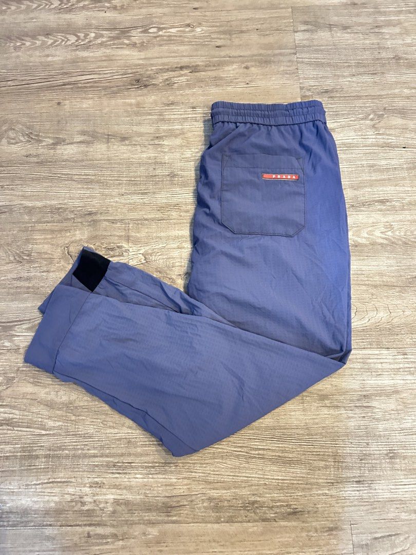 Prada - nylon track pants (Category: Joggers) located in Los Banos. Submitted by remynextdoor (Listing ID 1423447620, Image 3). Description: Waist: 33-38 Inseam: 26.5 in Thigh: 11 in Leg: 10 in Front Rise: 13 in NO MAIN TAG, FADED WASHTAG .