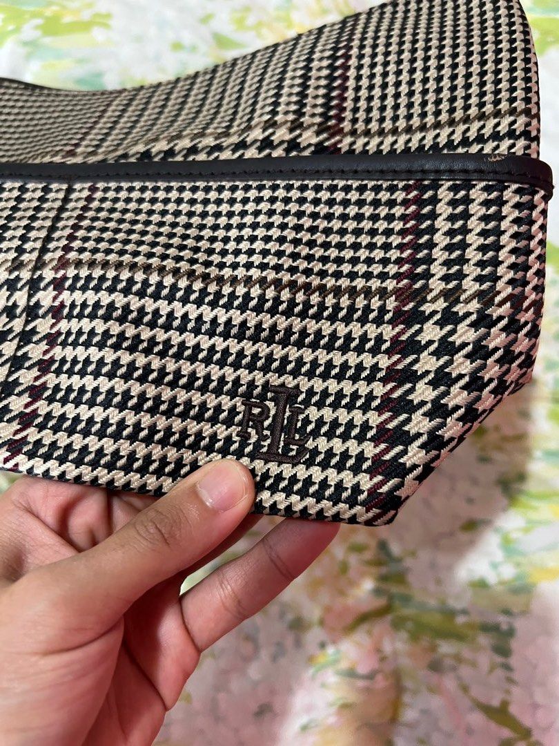 Ralph Lauren Shoulder Bag (Category: Luxury Bags & Wallets) located in Manila. Submitted by tjsells.101 (Listing ID 1423470483, Image 1). Description: Shoulder bag features a houndstooth pattern with a black leather trim and strap. The interior has a zippered pocket and a Lauren Ralph Lauren label. The bag has silver-tone hardware and a curved shape. The bag's exterior is a mix of black, beige, and burgundy. - Like new - rarely used - bought from