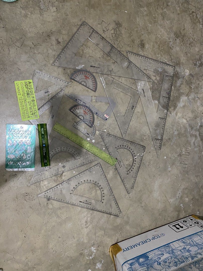 Rulers, Triangles, Templates (Category: Stationery & School Supplies) located in Pasay City. Submitted by john_cen (Listing ID 1423526900, Image 1). Description: - Set includes rulers, triangles, and templates. - Suitable for drafting and measuring tasks..