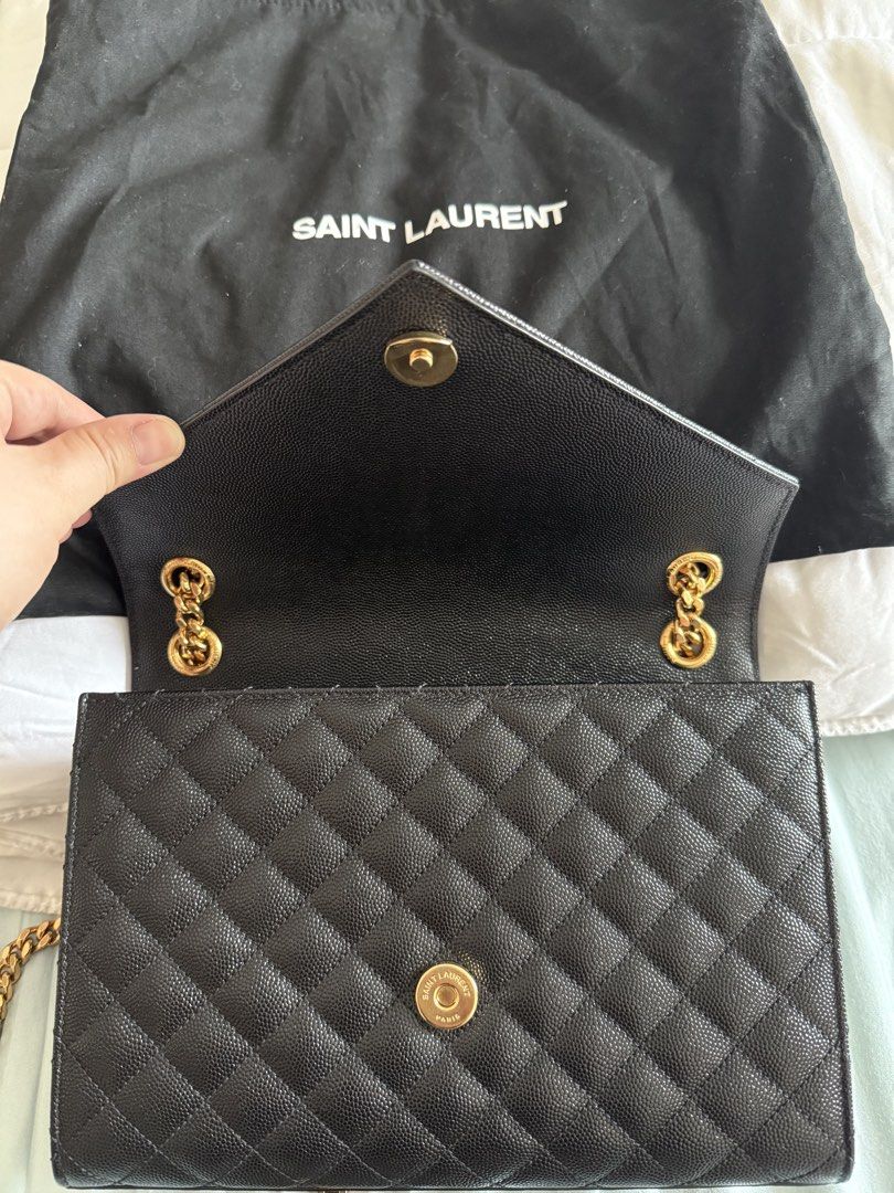Saint Laurent Envelope Chain Bag (Category: Luxury Bags & Wallets) located in Manila. Submitted by act23 (Listing ID 1423436859, Image 3). Description: AUTHENTIC WITH CERTIFICATE - Saint Laurent Envelope Chain Bag - Black color - Gold-tone hardware - Quilted design - Chain strap - Flap closure with YSL logo - Includes dust bag and card - Black interior .