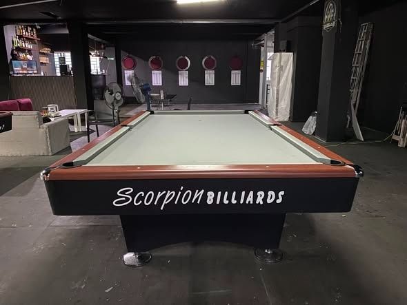 SCORPION 7 STANDARD BILLIARD TABLE (Category: Billiards and Bowling) located in San Pablo. Submitted by anneviiee0007 (Listing ID 1423451564, Image 2). Description: SCORPION 7 STANDARD BILLIARD TABLE FOR SALE TABLE SPECIFICATION: Size: 5x9ft (Tournament) Slate: Granite Sidings: Solid wood Cushion: Uylin Corner Pocket: Metal Side Pocket Cover: Metal Leg leveler: Adjustable Pocket: Manual ball INCLUSIONS: 1 Set. BILLIARD CLOTH WITH WHITE CLOTH 1 Pc