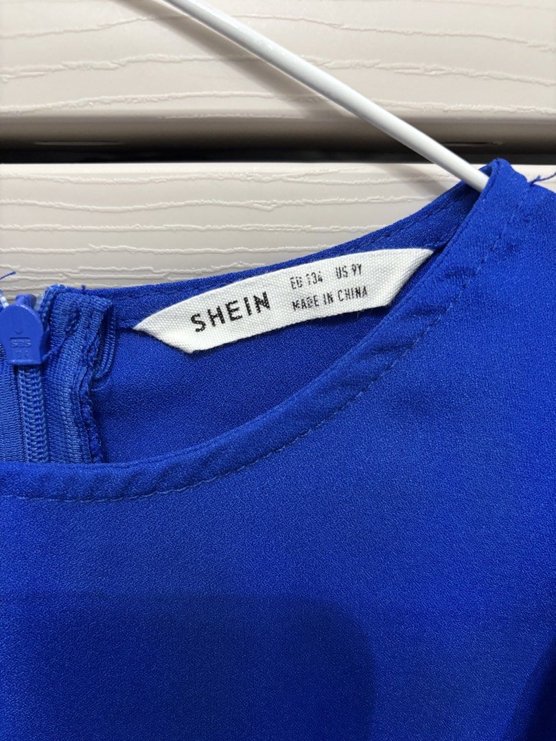Shein Blue Ruffle Sleeve Dress (Category: Babies & Kids Fashion) located in Manila. Submitted by mrsnice (Listing ID 1423532951, Image 3). Description: Shein Dress for 8-10yo In good condition Only for pickup at Aspire Tower Bagumbayan.