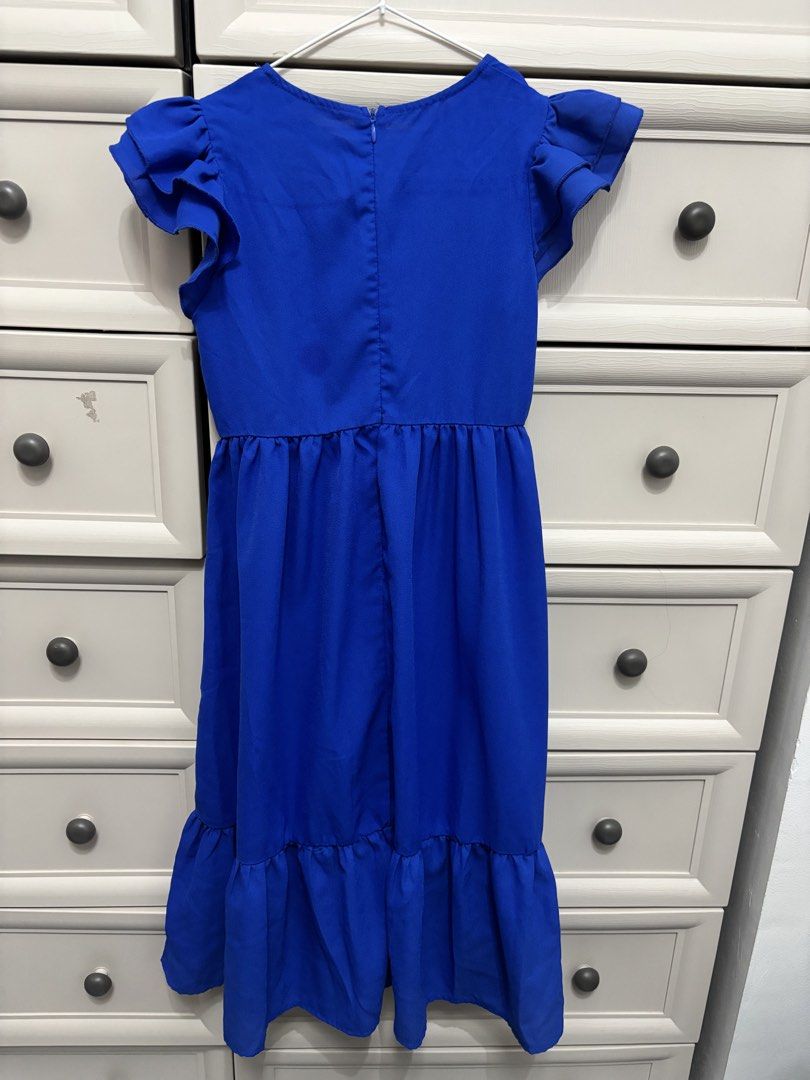 Shein Blue Ruffle Sleeve Dress (Category: Babies & Kids Fashion) located in Manila. Submitted by mrsnice (Listing ID 1423532951, Image 1). Description: Shein Dress for 8-10yo In good condition Only for pickup at Aspire Tower Bagumbayan.