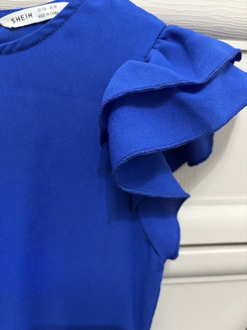 Shein Blue Ruffle Sleeve Dress (Category: Babies & Kids Fashion) located in Manila. Submitted by mrsnice (Listing ID 1423532951, Image 2). Description: Shein Dress for 8-10yo In good condition Only for pickup at Aspire Tower Bagumbayan.