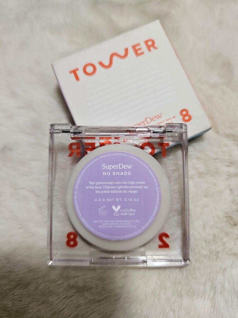Tower 28 SuperDew No Shade (Category: Makeup) located in Manila. Submitted by heartallthingspretty (Listing ID 1423553376, Image 2). Description: Tower 28 Superdew Shimmer Free Highlight Balm 4.5grams swatched Tower 28 SuperDew highlighter in No Shade. This is a clear, dewy balm highlighter. The product is in its original packaging. It is a vegan and cruelty-free product. The net weight is 4.5g / 0.16 oz..