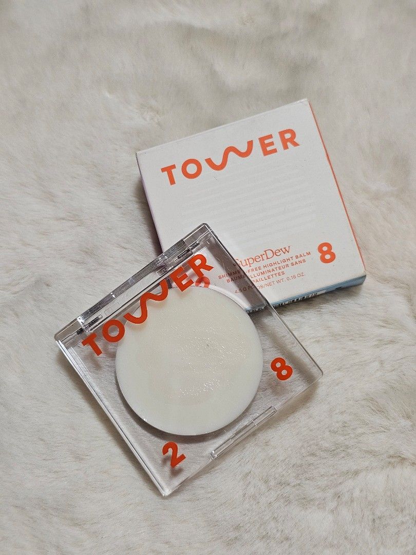 Tower 28 SuperDew No Shade (Category: Makeup) located in Manila. Submitted by heartallthingspretty (Listing ID 1423553376, Image 1). Description: Tower 28 Superdew Shimmer Free Highlight Balm 4.5grams swatched Tower 28 SuperDew highlighter in No Shade. This is a clear, dewy balm highlighter. The product is in its original packaging. It is a vegan and cruelty-free product. The net weight is 4.5g / 0.16 oz..