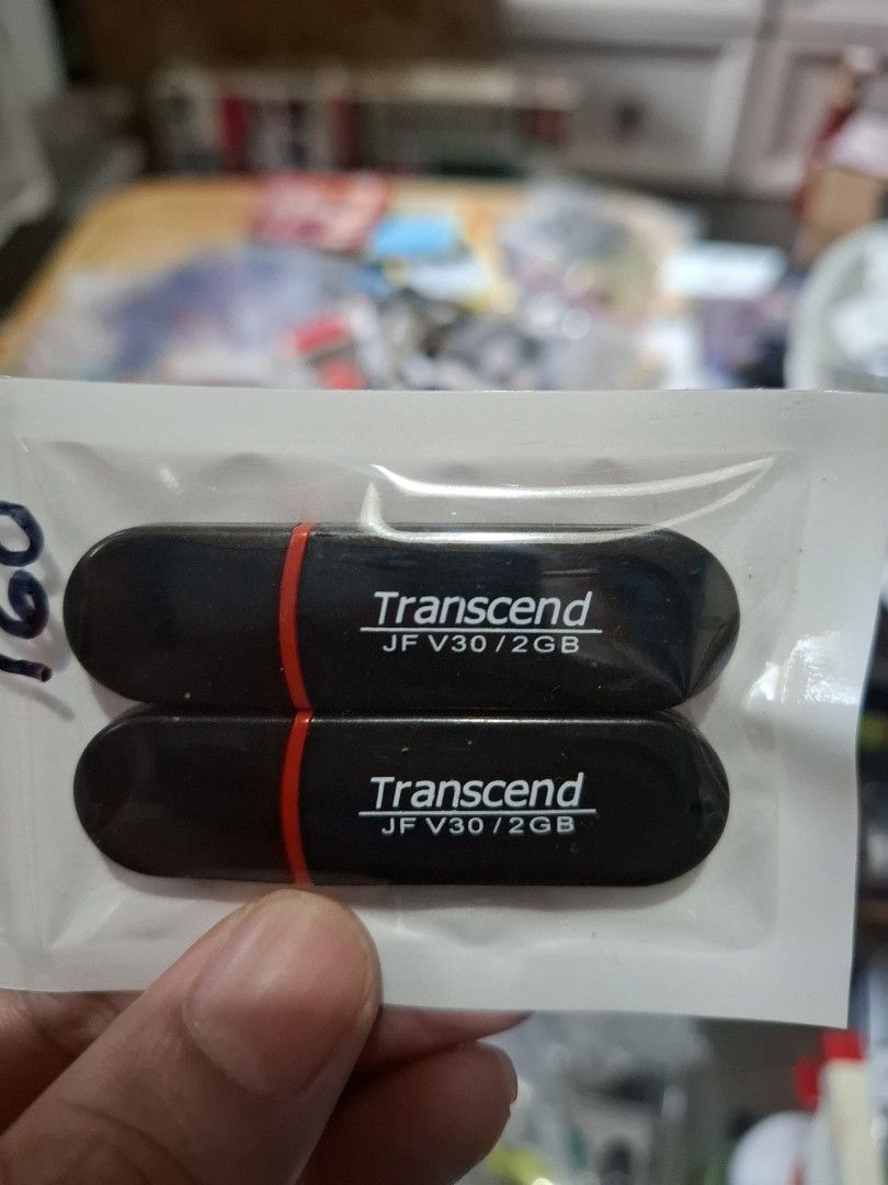 Transcend JF V30 2GB USB Flash Drive (Category: Hard Disks & Thumbdrives) located in Las Pinas. Submitted by All.here_OnlineShop (Listing ID 1423455028, Image 2). Description: Two Transcend JF V30 2GB USB used flash drives. Black with red stripe. Ready to use. 160 only.