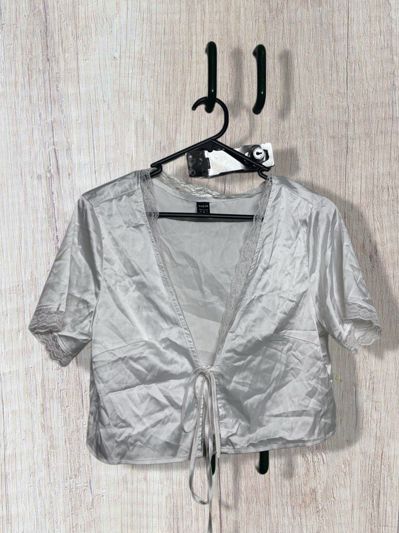 White Satin Lace Trim Crop Top (Category: Blouses) located in Muntinlupa City. Submitted by rinrinzzz (Listing ID 1423522416, Image 2). Description: - Never been used - Satin - Perfect for beach wears & casual wear 💗.