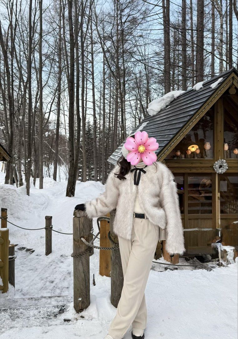 Winter White Fur Coat (not pure white) (Category: Coats, Jackets and Outerwear) located in Davao. Submitted by micahcm (Listing ID 1423461685, Image 2). Description: FOR RENT ONLY: -7 days -Deposit: 500 - Soft, fuzzy white jacket - Features a black bow detaily - Cropped style - Ideal for layering - Suitable for cold weather.