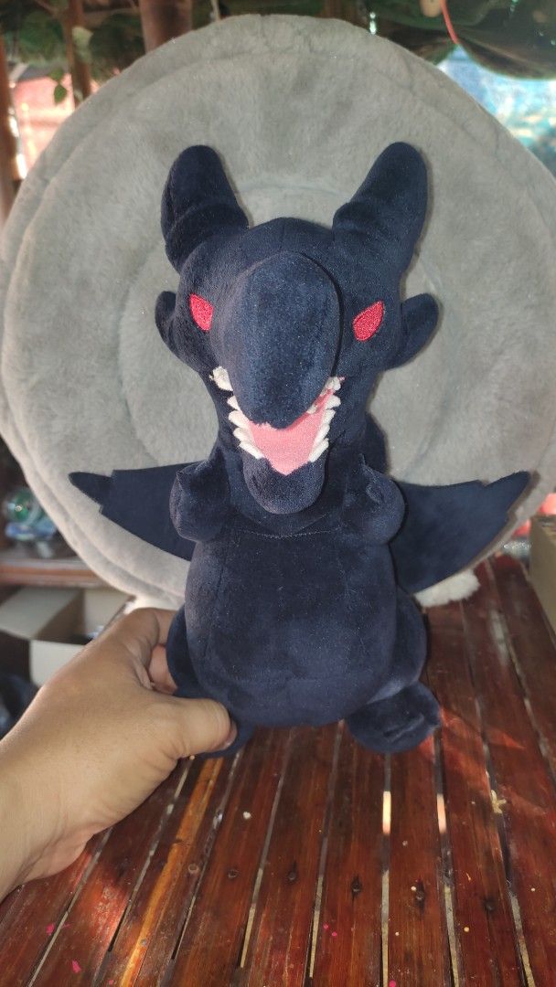 Yu-Gi-Oh Dark Dragon Plush Toy (Category: Plushies & Soft Toys) located in Tarlac. Submitted by maxgar16638 (Listing ID 1423539696, Image 2). Description: - Dark blue dragon plush toy - Features red eyes and white teeth - Includes wings - Soft and cuddly design - Made in Vietnam - Perfect for cuddling.
