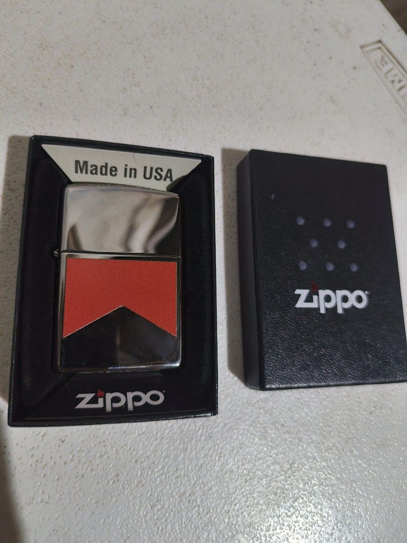 Zippo Lighter (Category: Other Home Appliances) located in Manila. Submitted by jimuelcaba48021 (Listing ID 1423564743, Image 1). Description: Brandnew Authentic Zippo lighter Marlboro Unfired Without Lighter Fluid Complete with box and authenticity paper.