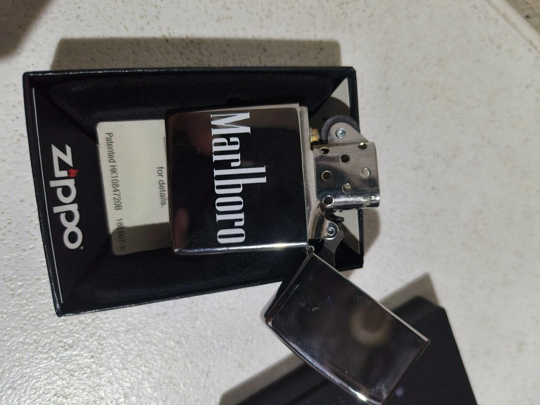 Zippo Lighter (Category: Other Home Appliances) located in Manila. Submitted by jimuelcaba48021 (Listing ID 1423564743, Image 3). Description: Brandnew Authentic Zippo lighter Marlboro Unfired Without Lighter Fluid Complete with box and authenticity paper.