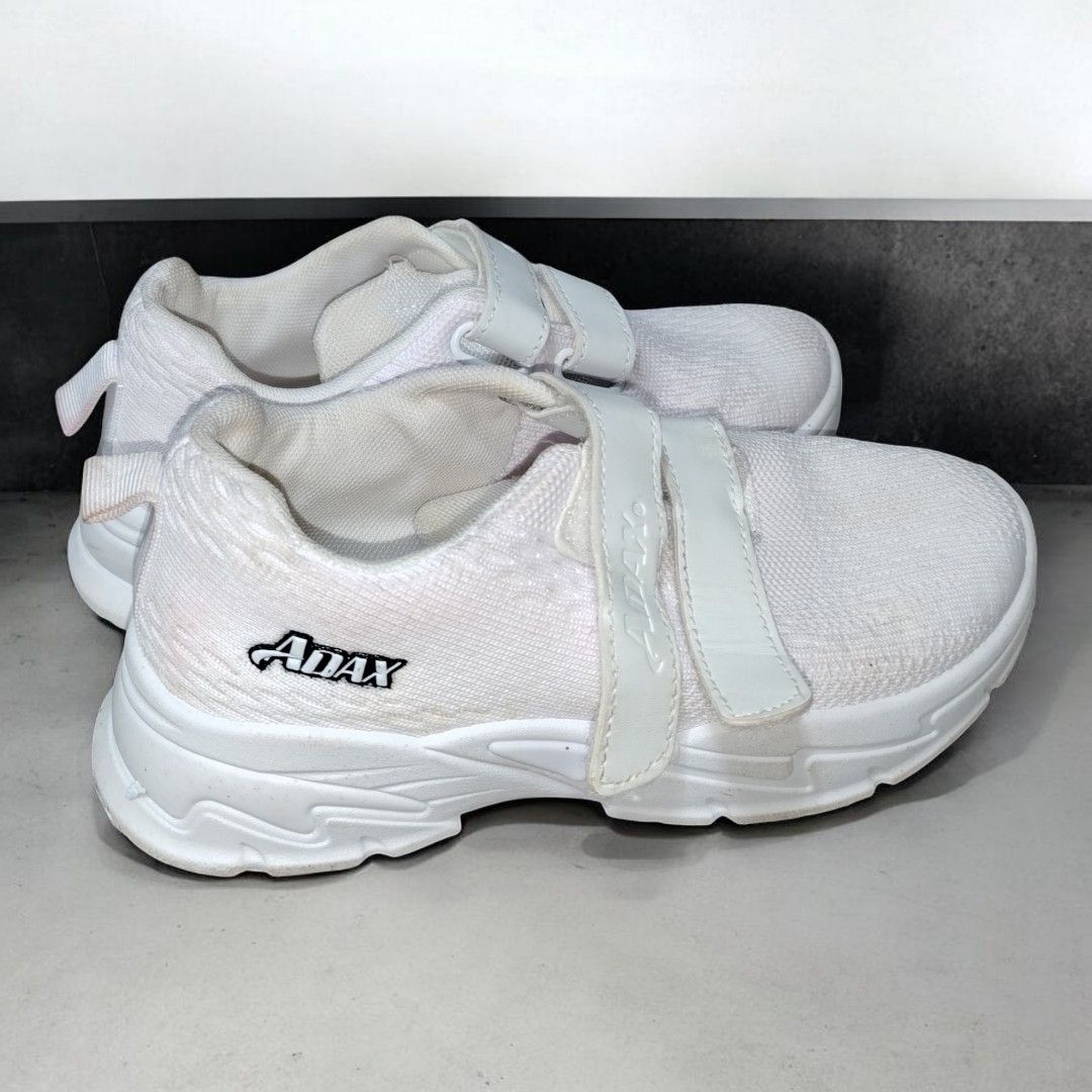 Adax White Velcro Sneakers - Size 35 (Category: Sneakers) located in Manila. Submitted by stuffzz2shop (Listing ID 1423755689, Image 3). Description: Kids Shoes – ADAX Brand 📏 Length: 8 inches 👟 Size: 35 🔄 Can fit adults with size 35 feet ✅Pre-loved but Pristine condition ✅ Washed and clean ✅ Mesh-like material for breathability ⚠️ Minor yellowing in some areas (may removed with thorough cleaning) Payment Methods: 💳 First to pay via GCash or 