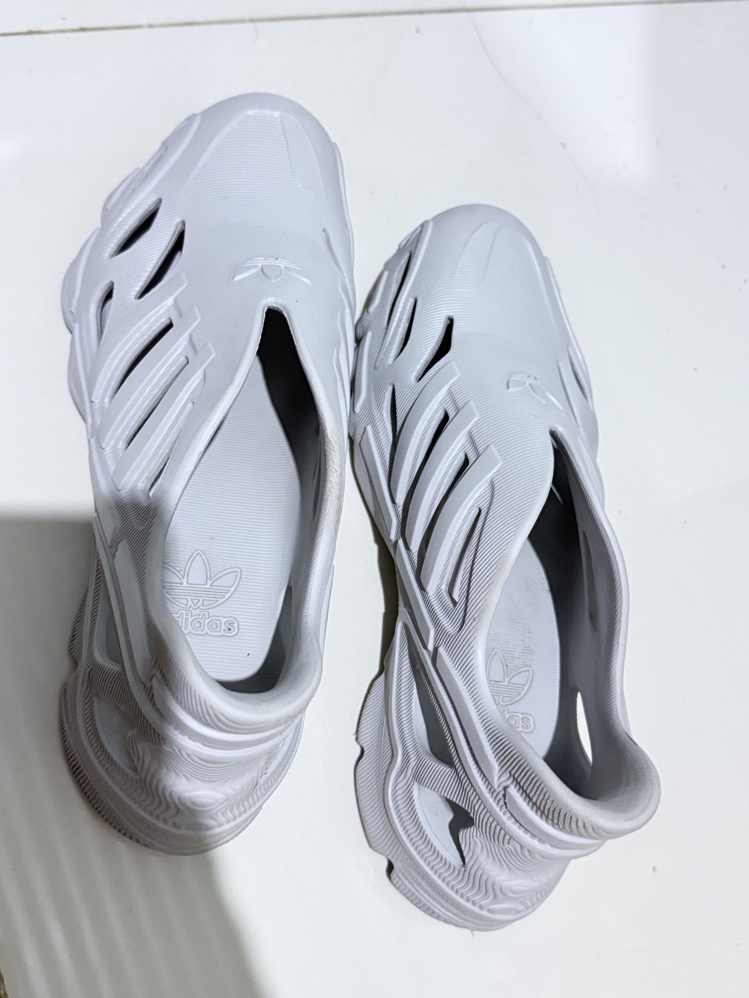 Adidas Adilette Clogs (Category: Slippers & Slides) located in Paranaque City. Submitted by thousandfold (Listing ID 1423727830, Image 2). Description: -Adidas perforated-design slip on sneakers -Adiform Supernova shoes Ang ganda kaso for me need may medyas pag susuotin kasi ung sa may buko buko ng paa parang tight but super gaan Pm ur offer or swap to catfood 😍💖.