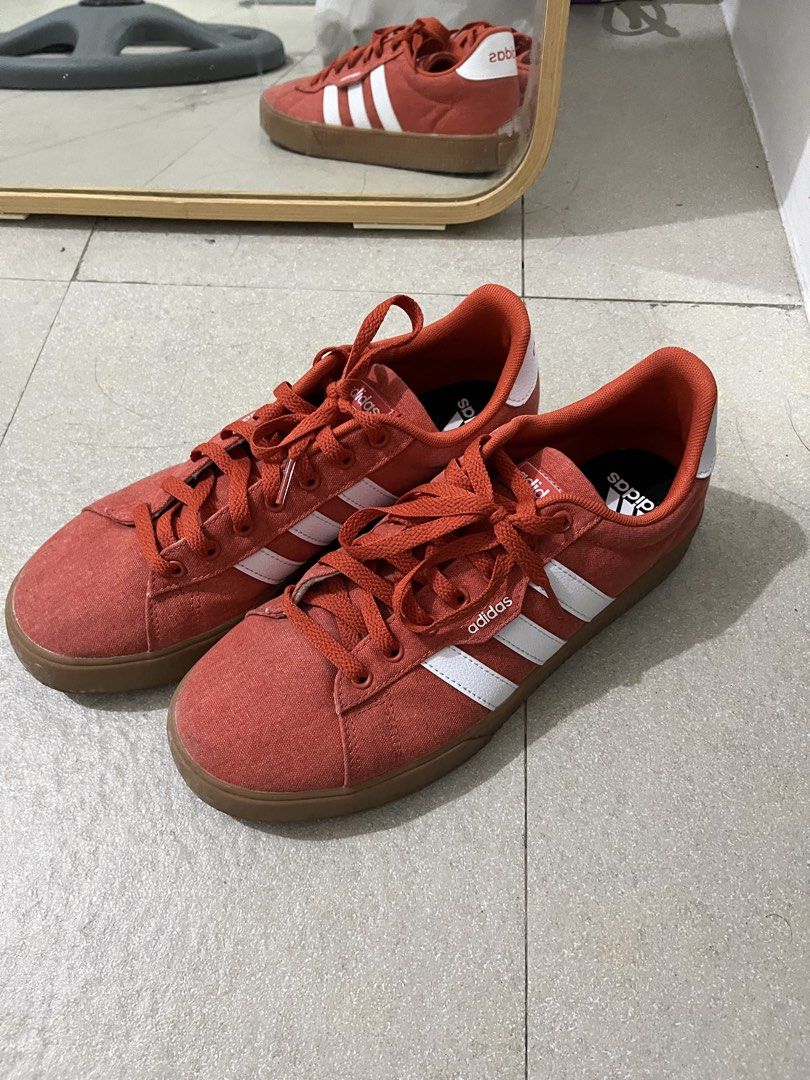 Adidas Daily 3.0 Shoes - Red (Category: Sneakers) located in Goa. Submitted by chiecheetos (Listing ID 1423625754, Image 2). Description: - Adidas Daily 3.0 shoes - Color: Red upper with white stripes - Size: US 9, UK 8.5, EUR 42 2/3 - Features a gum sole - Made in Cambodia - Condition: Good bought from shoppee with box! ⭐️ rfs: decluttering.