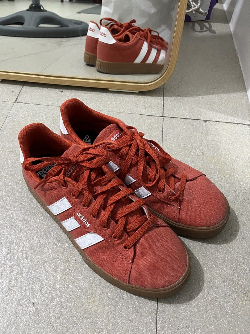 Adidas Daily 3.0 Shoes - Red (Category: Sneakers) located in Goa. Submitted by chiecheetos (Listing ID 1423625754, Image 1). Description: - Adidas Daily 3.0 shoes - Color: Red upper with white stripes - Size: US 9, UK 8.5, EUR 42 2/3 - Features a gum sole - Made in Cambodia - Condition: Good bought from shoppee with box! ⭐️ rfs: decluttering.