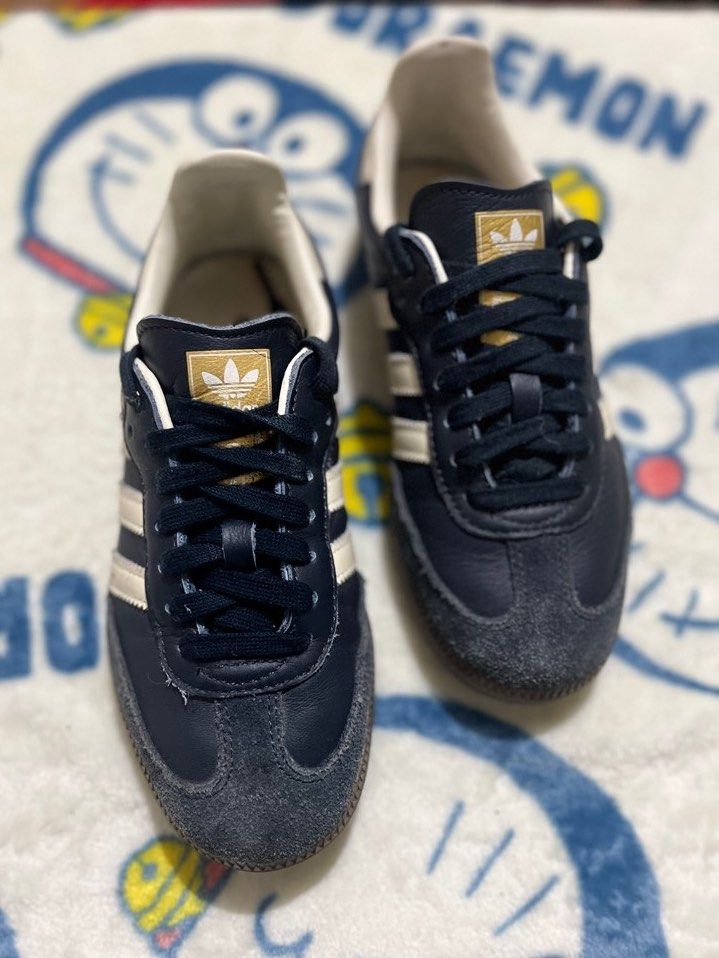Adidas Samba Navy Blue Sneakers (Category: Sneakers) located in Baguio. Submitted by pickles_jabo (Listing ID 1408668980, Image 3). Description: - Adidas Samba sneakers - Navy blue with white stripes - Gum sole - Adidas logo on tongue and side - Size indicated on inner label - Perfect for everyday wear.