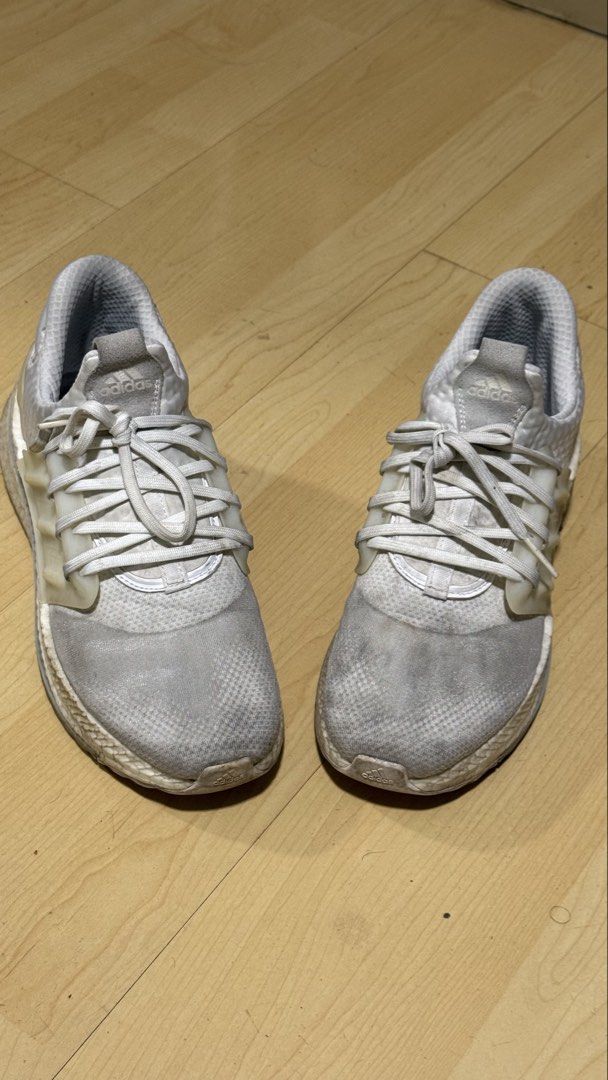 Adidas Ultraboost Sneakers (Category: Sneakers) located in Mandaluyong City. Submitted by mr022 (Listing ID 1423667709, Image 3). Description: - Adidas Ultraboost sneakers - White color - Lace-up closure - Cushioned sole - Visible wear on soles - Adidas logo on heel - waterproof upper material -Can still be cleaned/restored via deep cleaning For meet-up only RFS: need funds for medical bills.