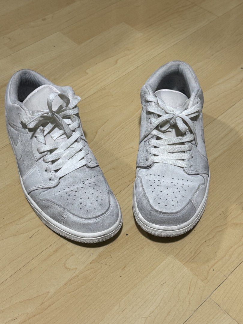 Air Jordan 1 Low White (Category: Sneakers) located in Mandaluyong City. Submitted by mr022 (Listing ID 1423665731, Image 3). Description: - Air Jordan 1 Low - Color: White - Features Nike swoosh - White laces and sole - Signs of wear on sole - Perforated toe box - Air Jordan logo visible -Top is all suede. Dirts are visible but still can be removed and cleaned For meet-up only RFS: need funds for medical bills.
