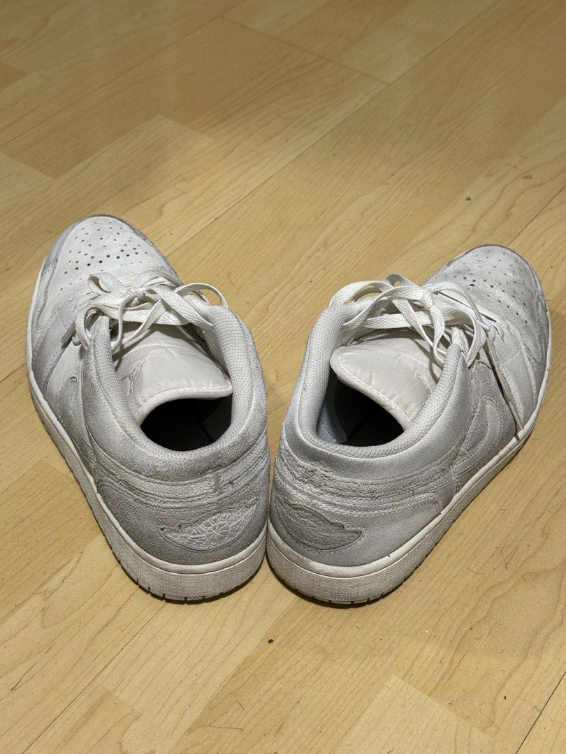 Air Jordan 1 Low White (Category: Sneakers) located in Mandaluyong City. Submitted by mr022 (Listing ID 1423665731, Image 1). Description: - Air Jordan 1 Low - Color: White - Features Nike swoosh - White laces and sole - Signs of wear on sole - Perforated toe box - Air Jordan logo visible -Top is all suede. Dirts are visible but still can be removed and cleaned For meet-up only RFS: need funds for medical bills.