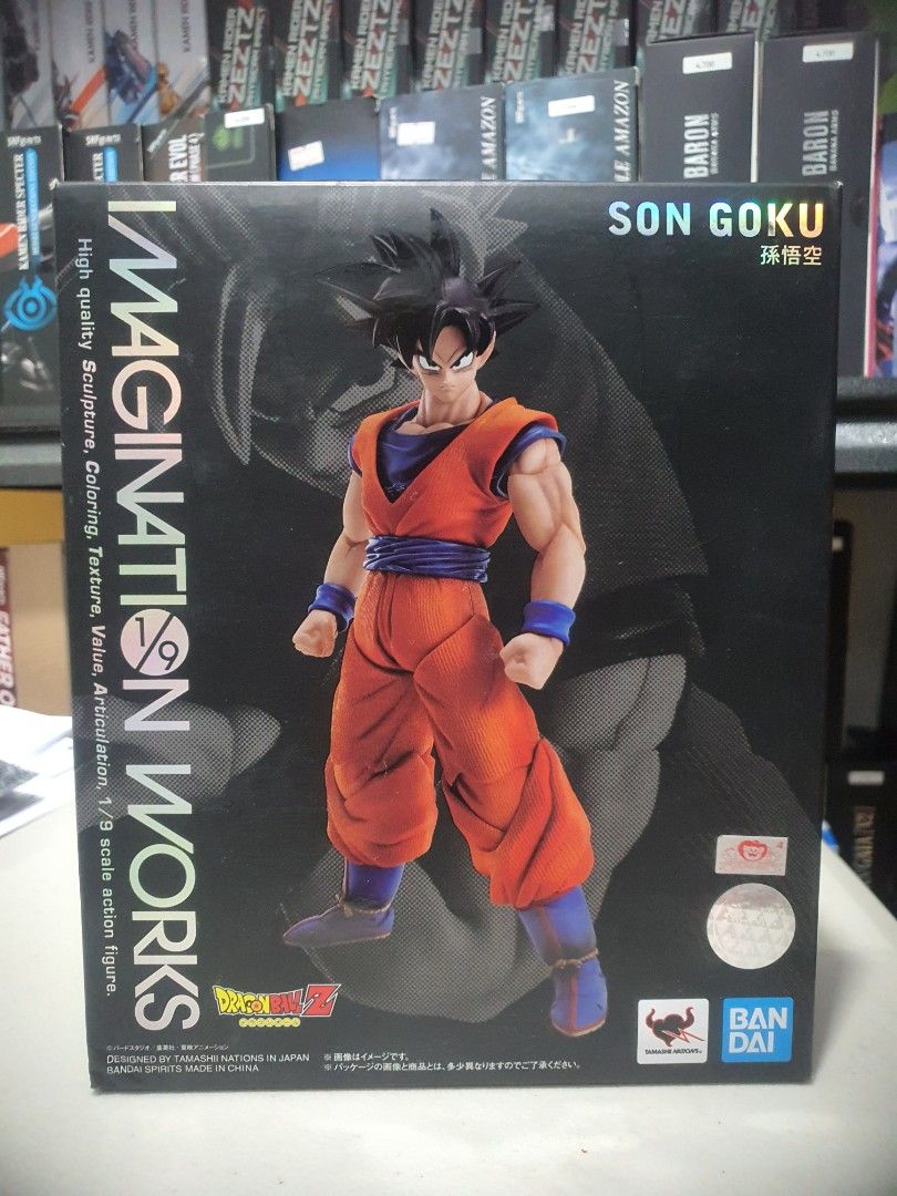 Bandai Imagination Works Son Goku Figure (Category: Figurines & Statues) located in Mandaluyong City. Submitted by xplay_collectibles (Listing ID 1423662588, Image 1). Description: - Son Goku Imagination Works action figure by Bandai. - 1/9 scale. - Features high-quality sculpting, coloring, and texture. - Excellent articulation. - Box displays the figure in various poses. - Back of the box shows different versions..