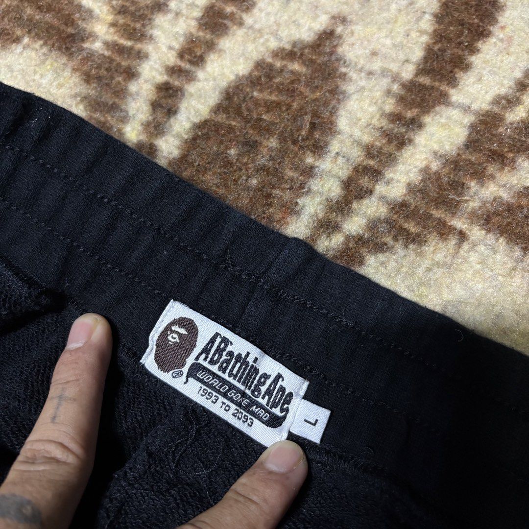 BAPE Shark Shorts - Black - Size L (Category: Shorts) located in Basista. Submitted by yesterdaze.ph (Listing ID 1423773005, Image 3). Description: - BAPE Shark Shorts - Color: Black - Size: L - Cut Washtag/Gold - Iconic shark face design - BAPE tag included - Comfortable material - Perfect for streetwear.